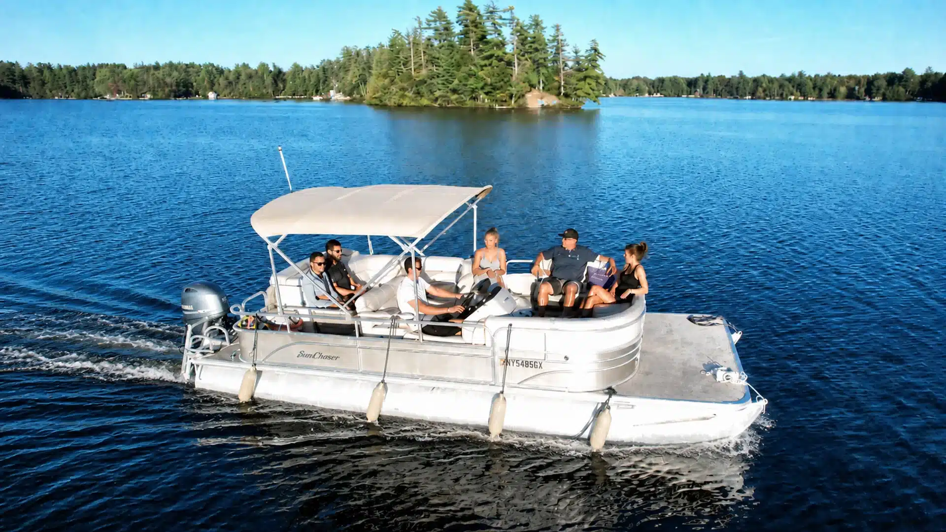Pontoon boat rental for a Brantingham Lake adventure from Grant Island